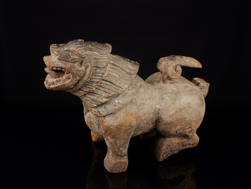 an 18th c burmese carved wood temple lion chinthe