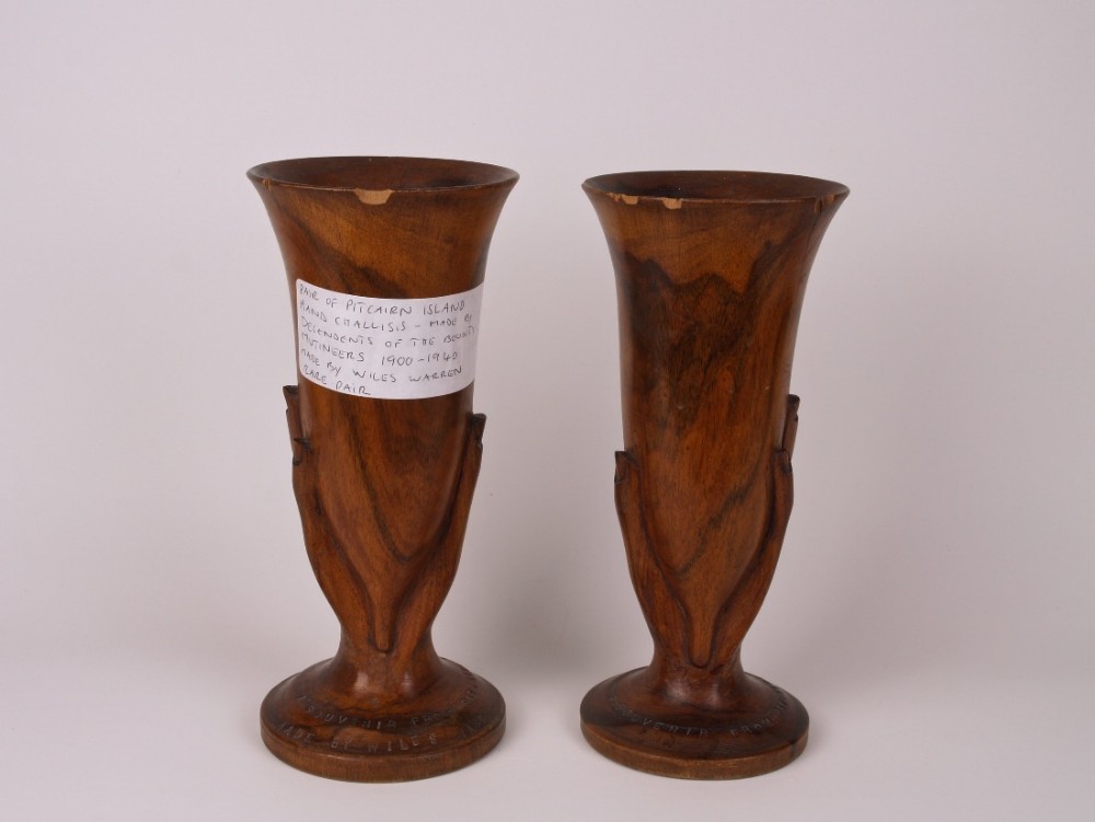a pair of inscribed pitcairn island mirowood spill vases by wiles warren
