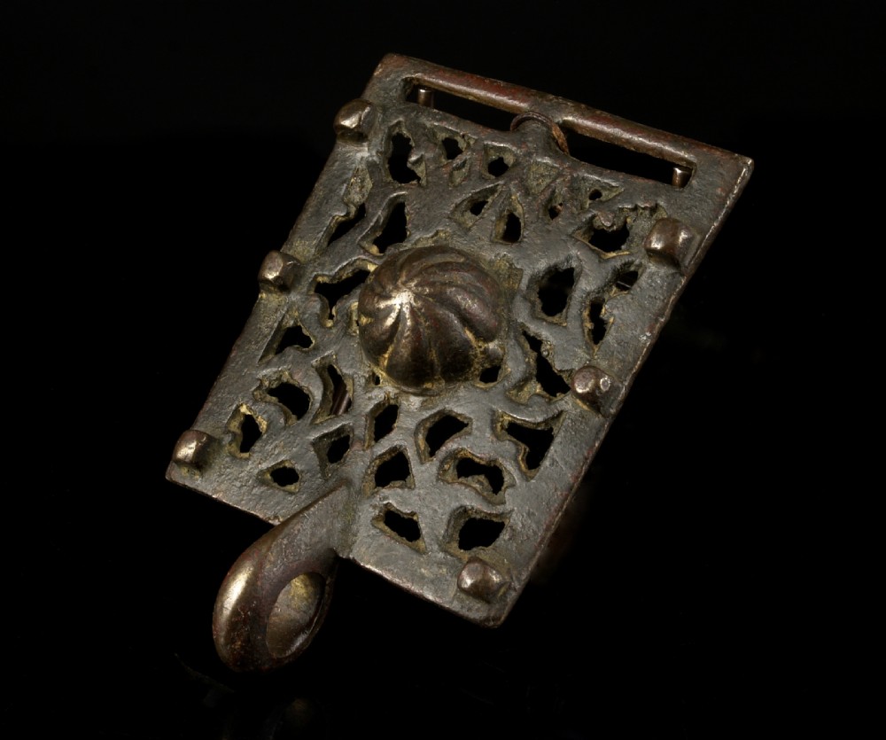 a 17th century mughal cast bronze strap embellishment
