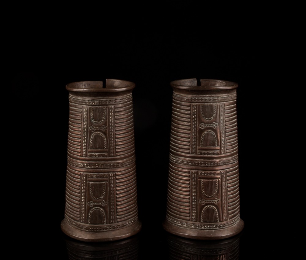 a scarce pair of copper alloy 'cuff' bracelets baule people ivory coast early to mid 20th century