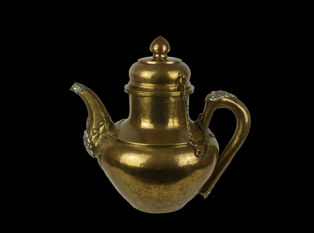 a 19th century tibetan silver copper mounted brass 'buttertea' pot