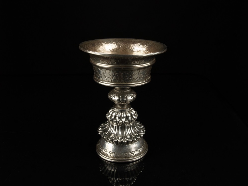 a fine 19th century tibetan silver buddhist monastic butter lamp