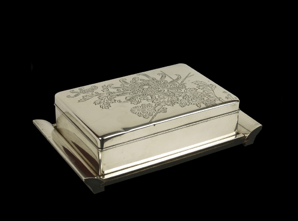 a hallmarked japanesse sterling siver ebony box stand circa 1925