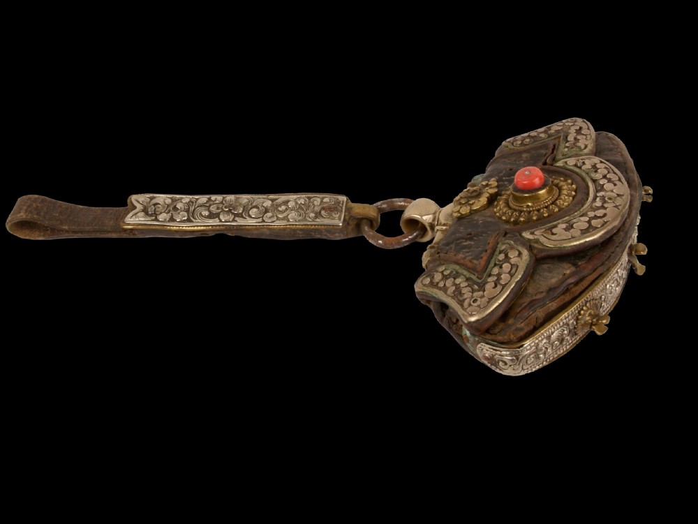a 19th century tibetan silver brass mounted leather purse form pouch baghu