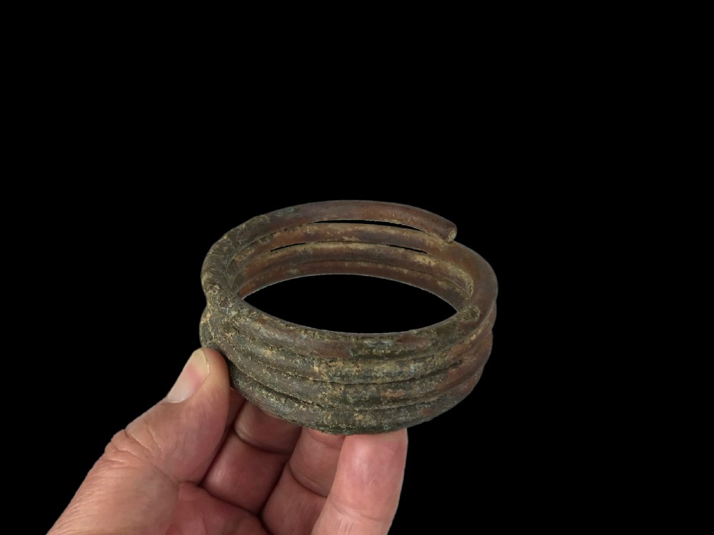 a copper alloy bronze multicoil form bangle bracelet burma circa 1880 possibly earlier