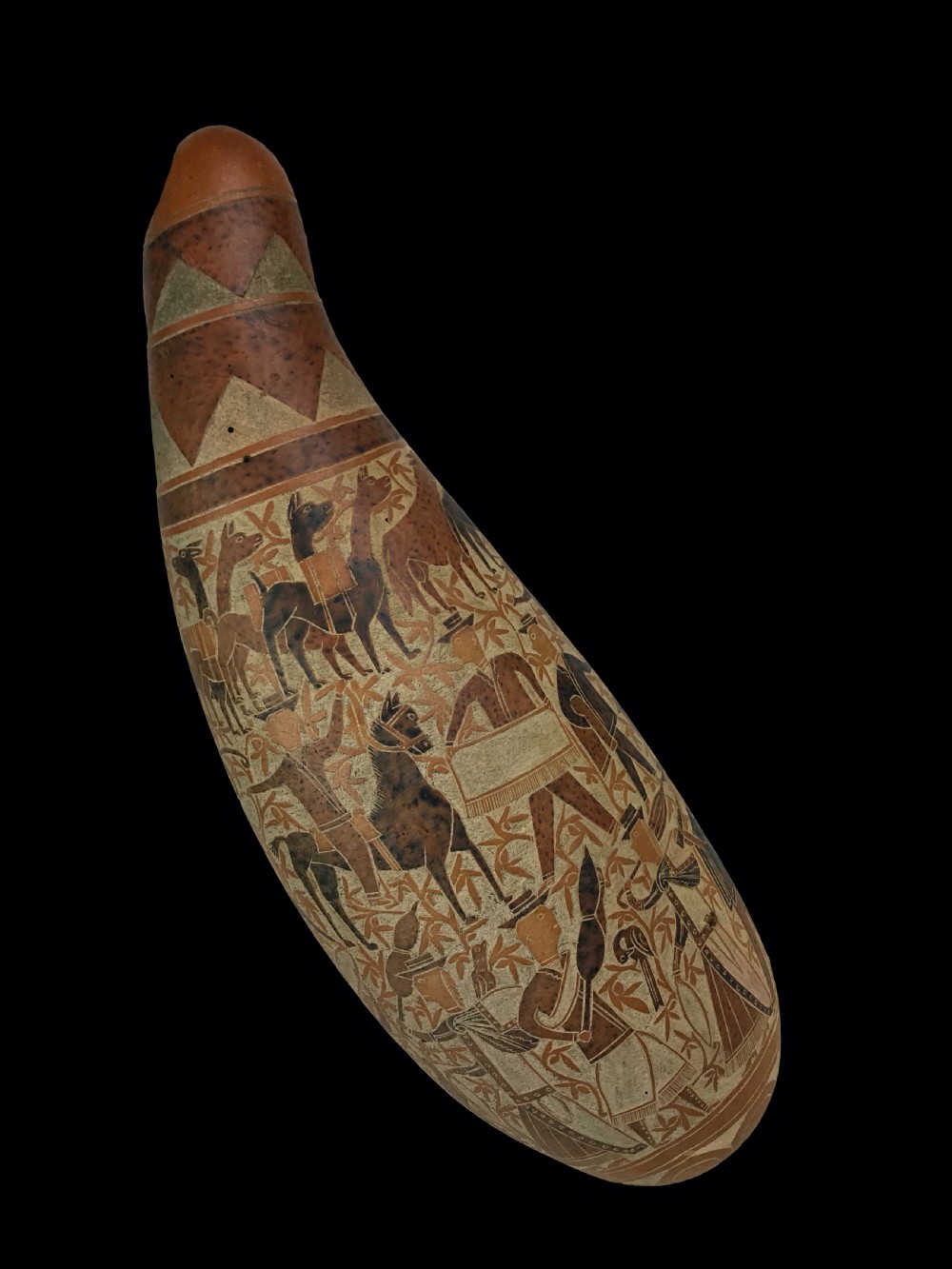 an intricately figuratively carved gourd vessel peru early mid 20th century