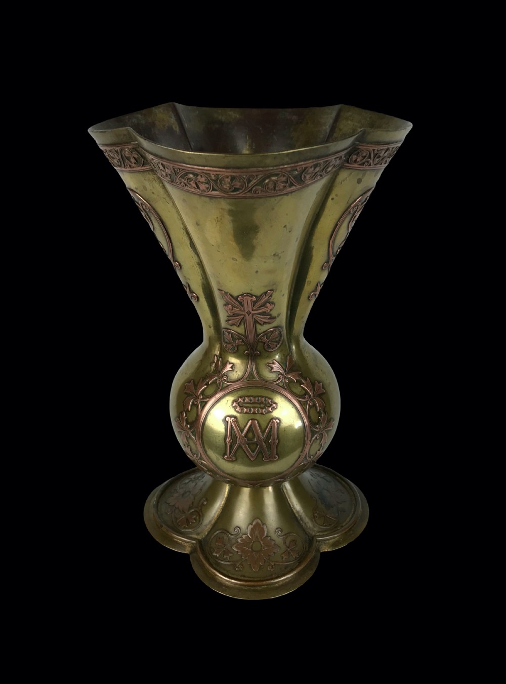 a mid 19th century copper overlaid ecclesiastical gothic brass vase attributed to augustus pugin