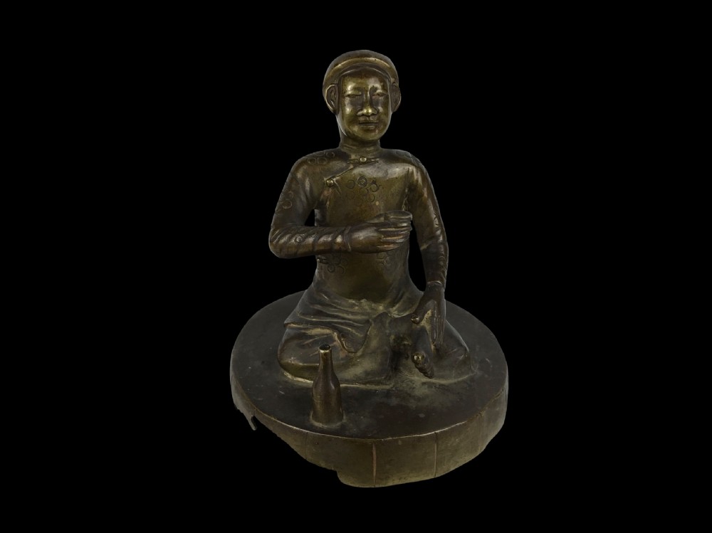 an unusual southeast asian cast bronze figure probably burmese mid 19th century