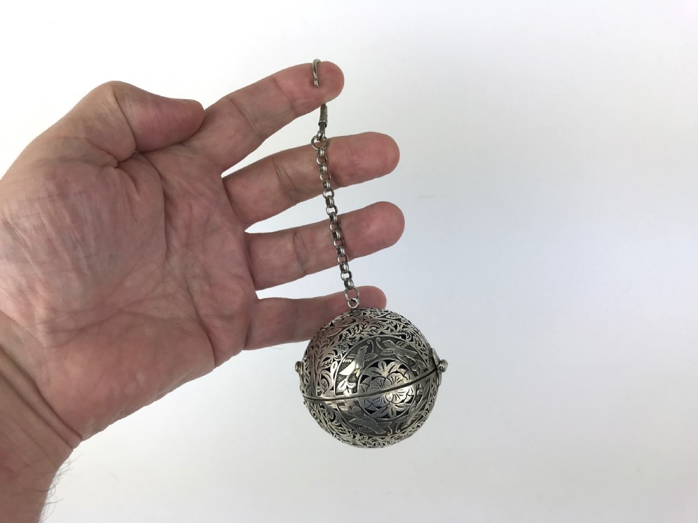 a suspended multigimbal silver incense burner northwest india late 19th century