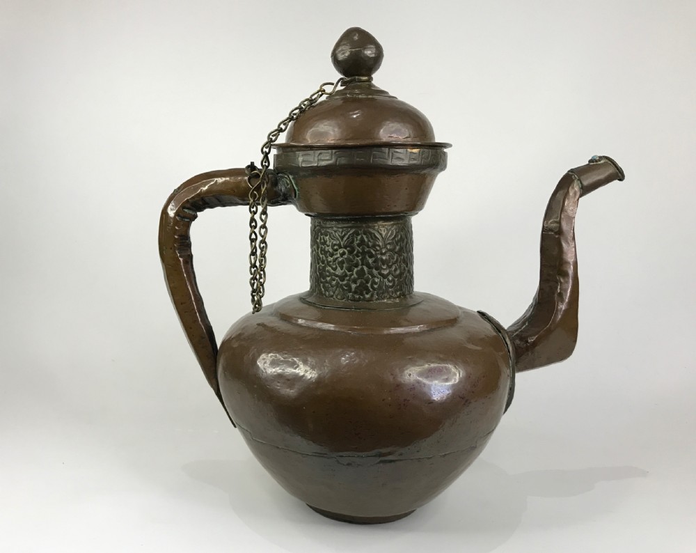 a tibetan turquoise mounted copper 'buttertea' pot late 19th century