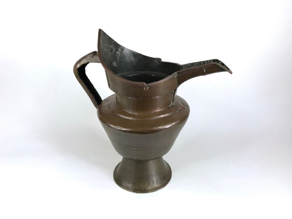 a wrought copper brass 'monk's cap' ewer tibet mid 19th century