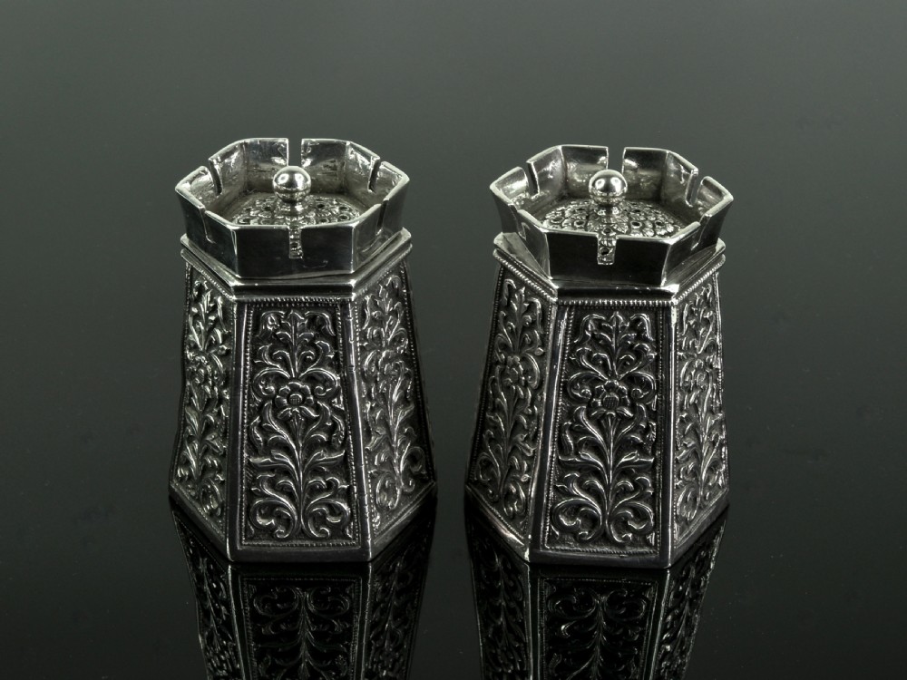 a pair of kutch silver pounce pots by oomersee mawji mawjee bhuj northwest india circa 1870