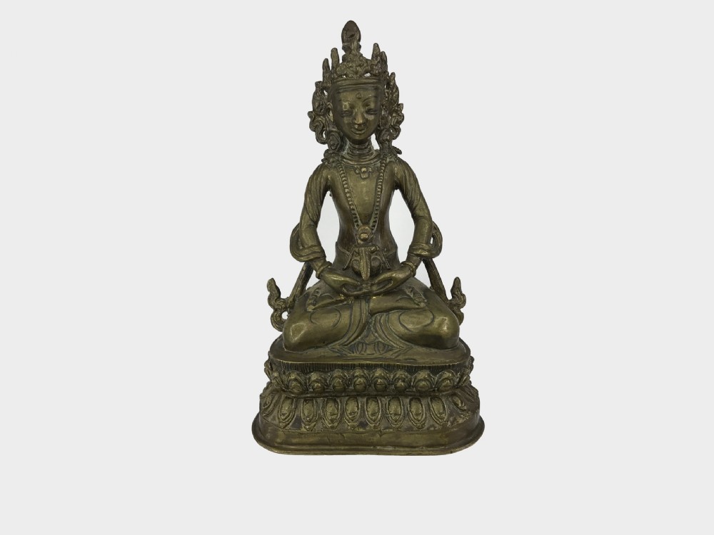 a finely cast copper alloy seated figure of buddha amitayus nepal circa late 19th to very early 20th century