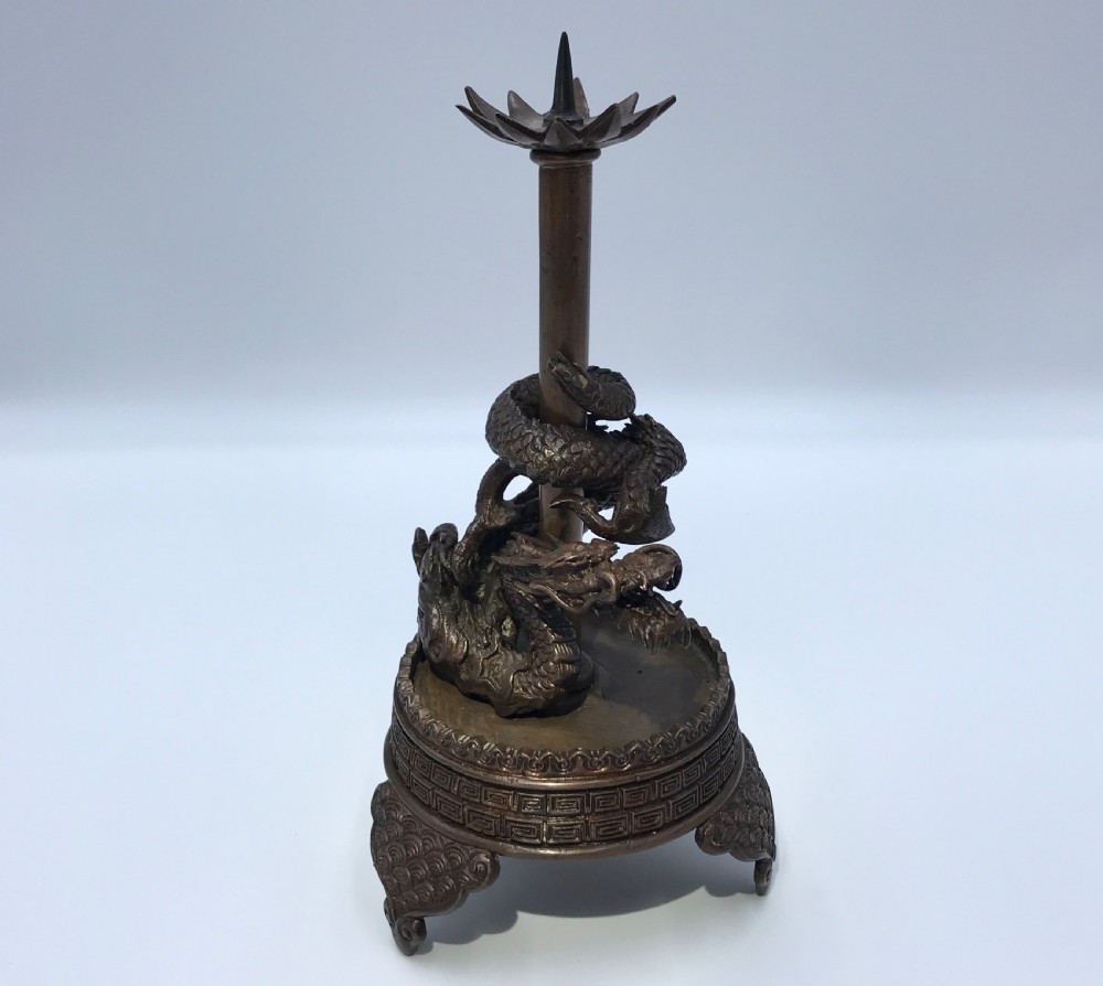 a cast bronze dragon mounted 'pricket' candlestick japan meiji period 19th century
