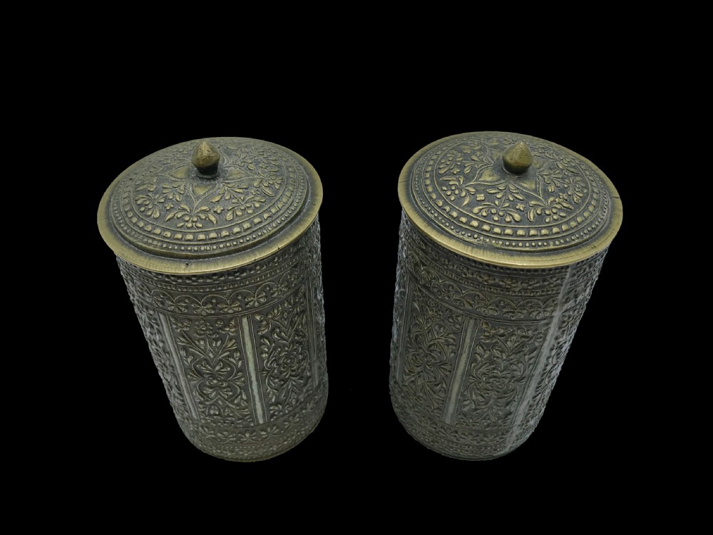 a finely cast brass pair of betel tobacco boxes sumatra indonesia circa 1900
