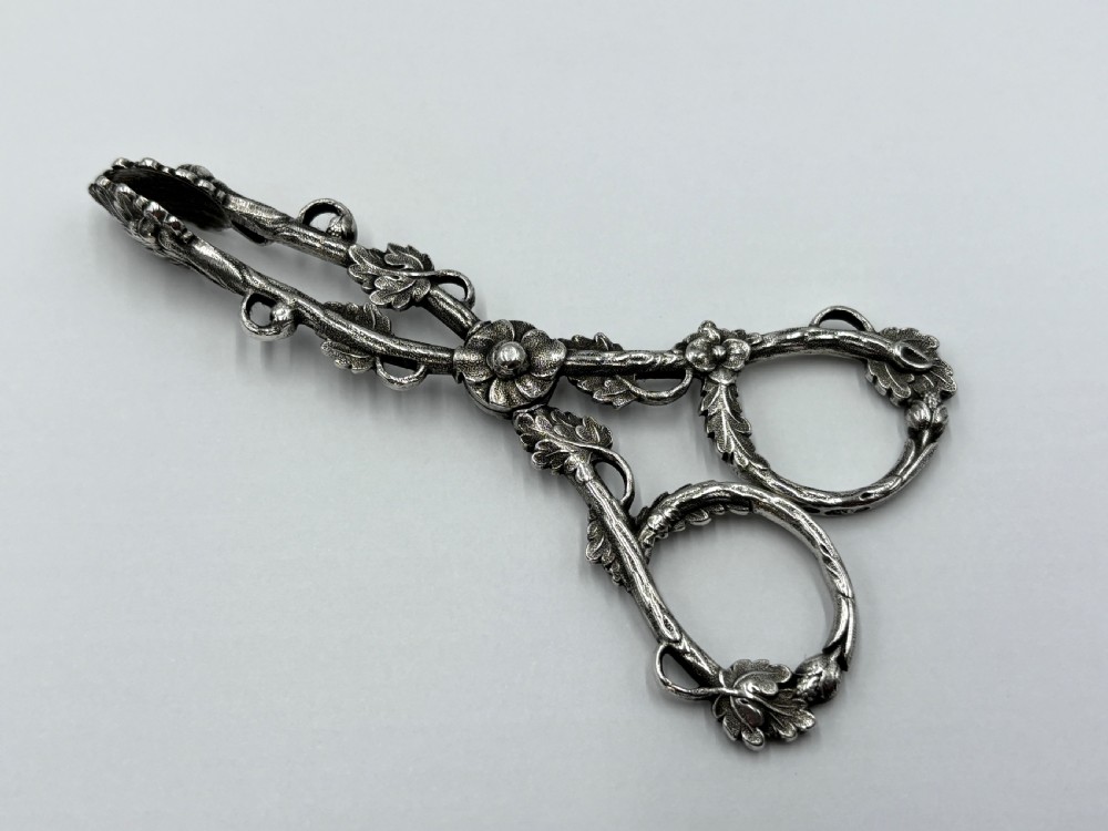 a pair of early 19th century hallmarked sterling silver sugar nips by joseph willmore
