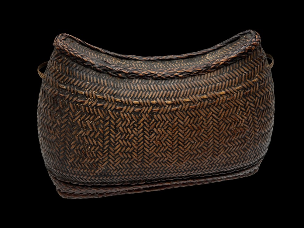 a large unusual southeast asian headrest pillow form betel box borneo early 20th century