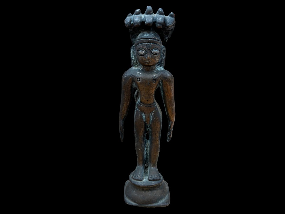 a cast bronze figure of a jain tirthankara india late 19th century