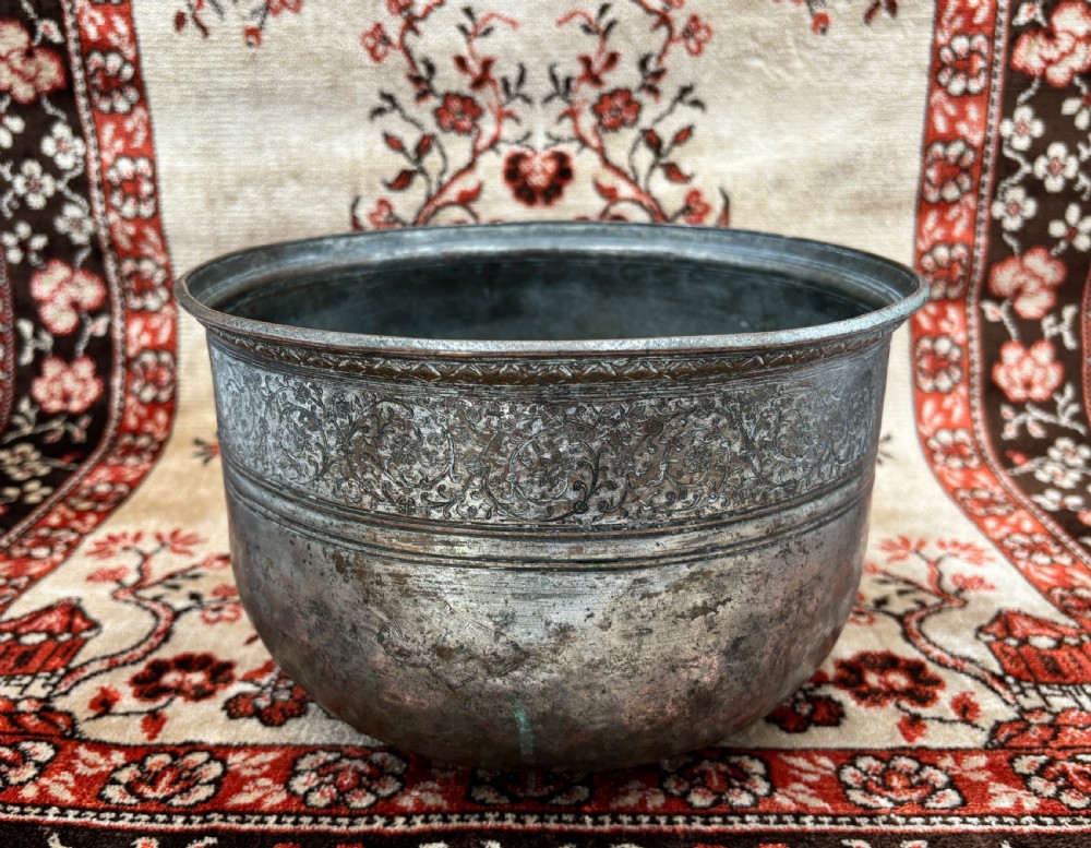a 17th century islamic tinned copper bowl original owner's cartouche