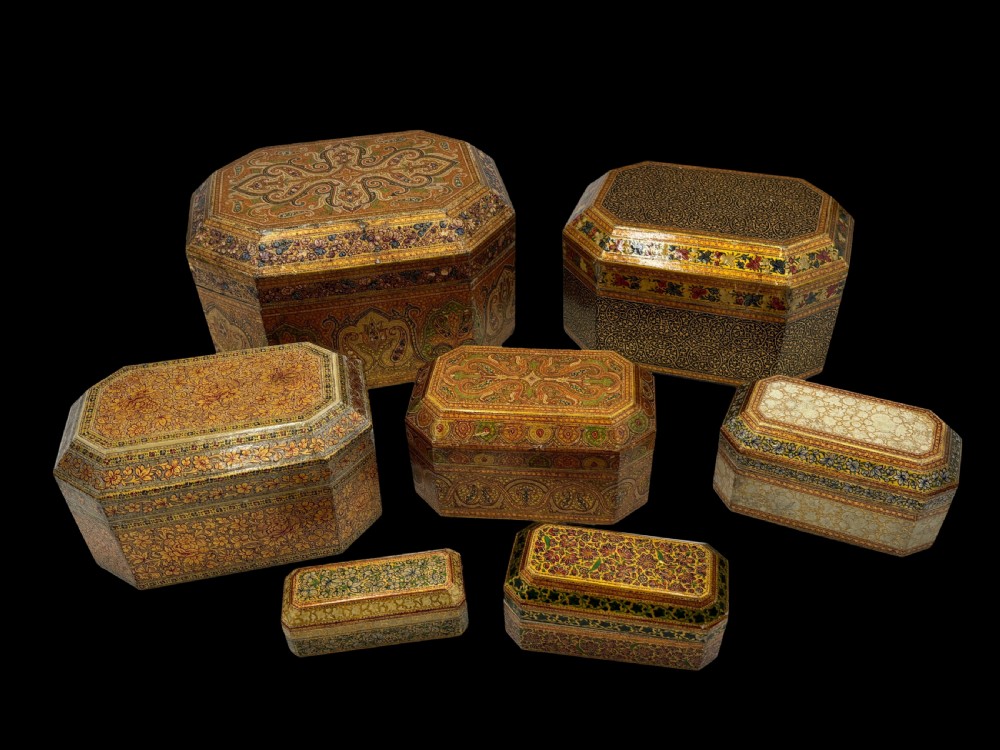 a set of seven fine lozenge form stacking lacquered wood boxes kashmir circa 1880