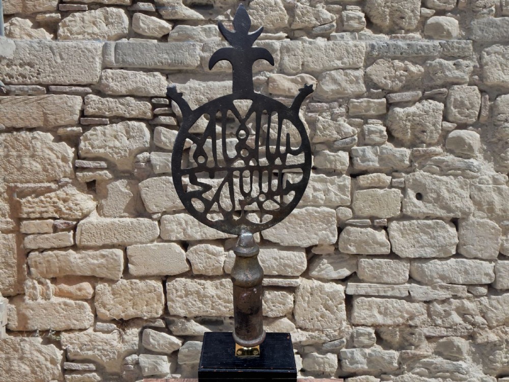 an inscribed islamic copper alloy alam flagpole finial northwest india 19th century