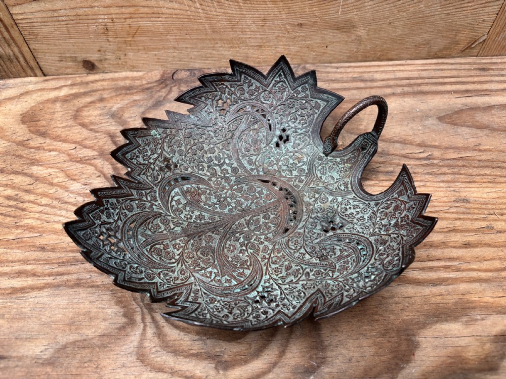 a finely decorated copper 'chinar' leaf dish kashmir circa 1880